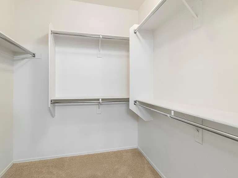 Master bedroom walk in closet