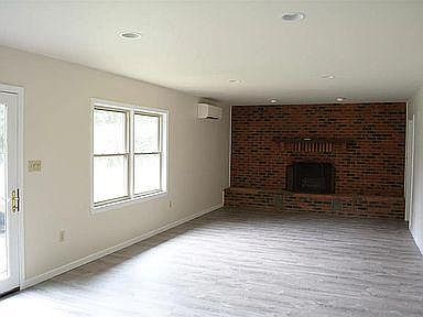 Besament living room with fire place