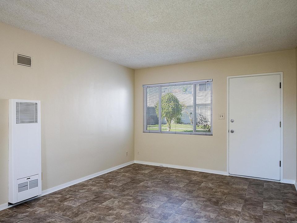 Living Room, window looks onto the courtyard