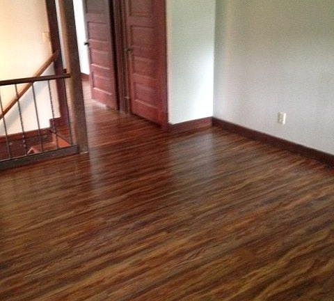 Living Room with brand-new laminate wood flooring.