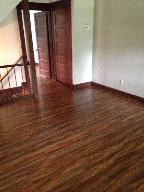 Living Room with brand-new laminate wood flooring.
