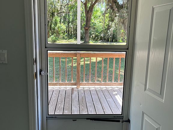 Front door has storm door to allow the natural light inside.