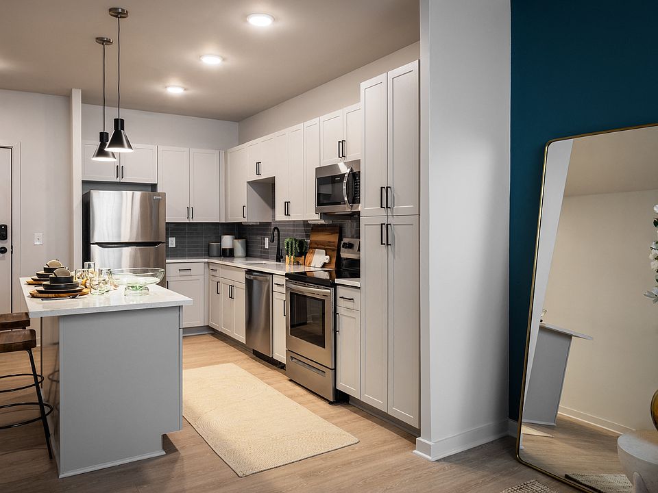 1 Bedroom Kitchen with stainless appliances and granite countertops