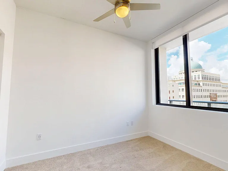 Spacious apartment Bedroom with Carpet Floor.