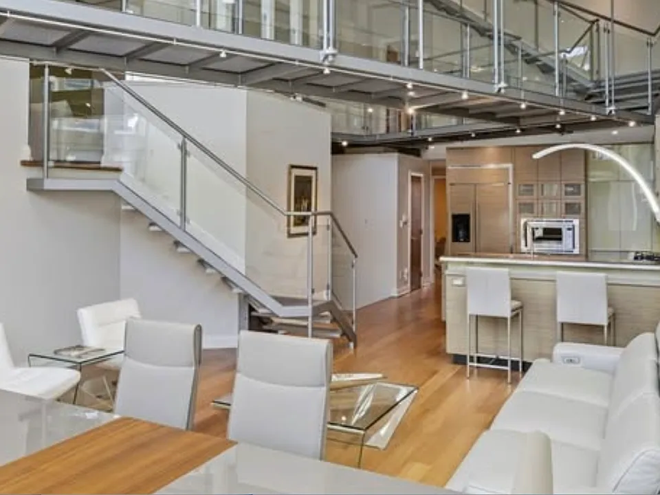 huge kitchen, entertainment room and dining room with catwalk and soaring ceilings