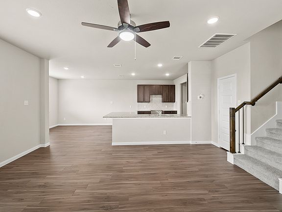 Family Room to Kitchen and Dining Area