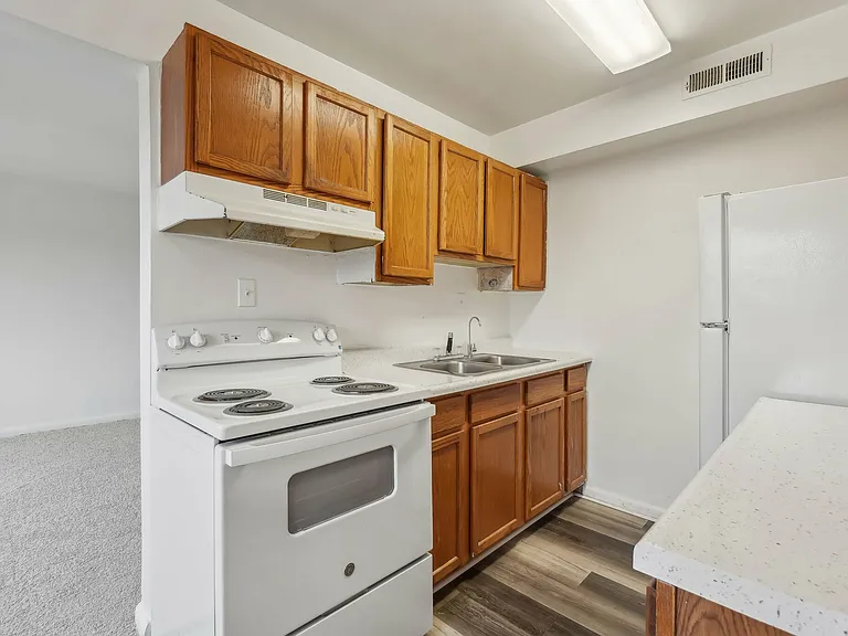 Experience convenience in this efficient kitchen layout with ample storage. Experience convenience in this efficient kitchen layout with ample storage.