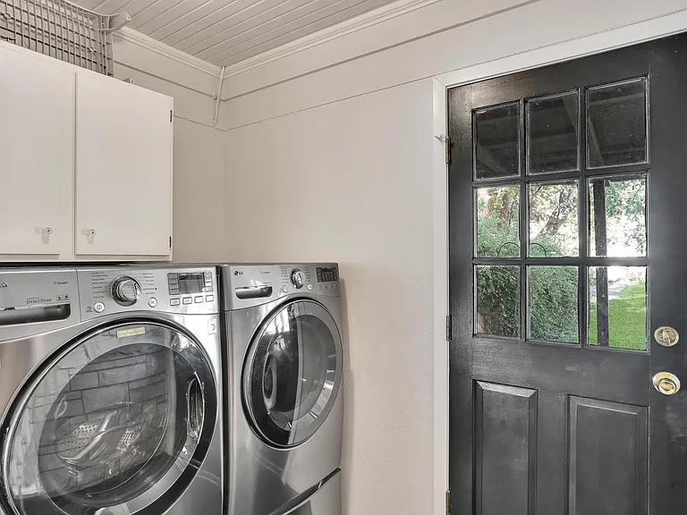 Utility room with LG Washer/Dryer.