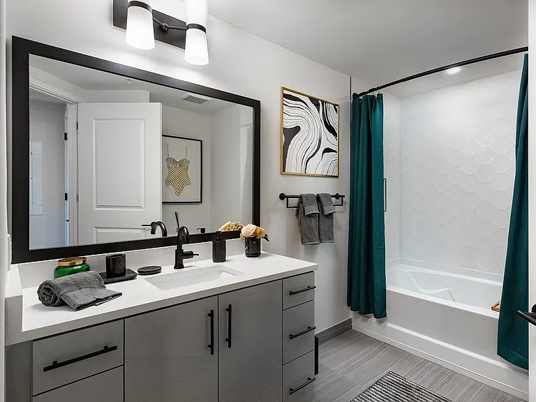 Bathrooms are complete with luxury tile showers and soaking tubs.