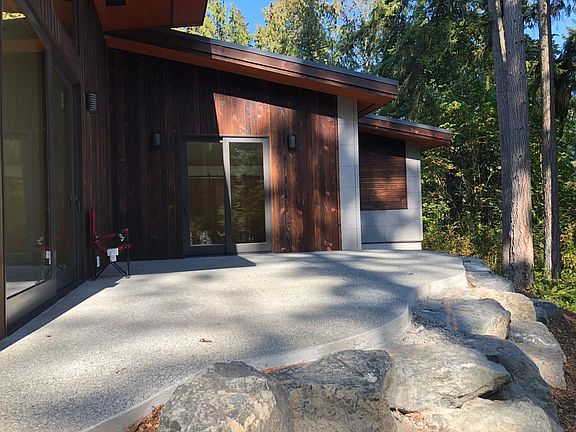 Back patio looking at 8 foot tall bedroom slider