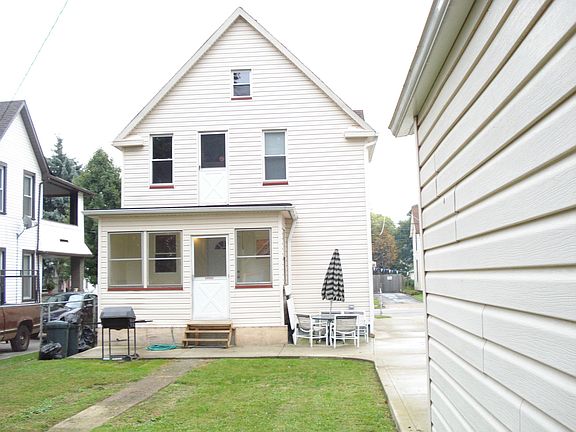 Back view with enclosed porch