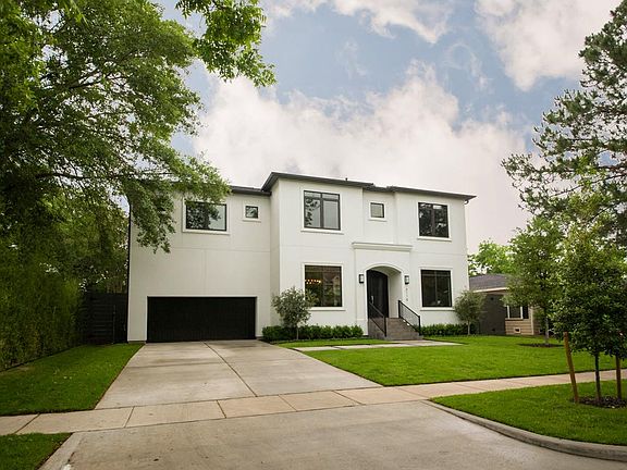 This home has professional landscaping, sprinkler systems in front and back and a double wide drivew