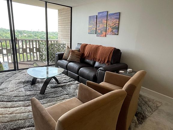 Living area, both sides of the sofa recline and have usb ports