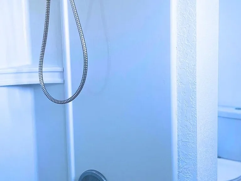 Downstairs bathroom tub and shower