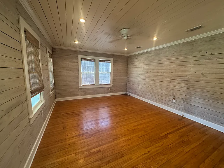Main living room area, large enough for a sectional and a recliner or two chairs