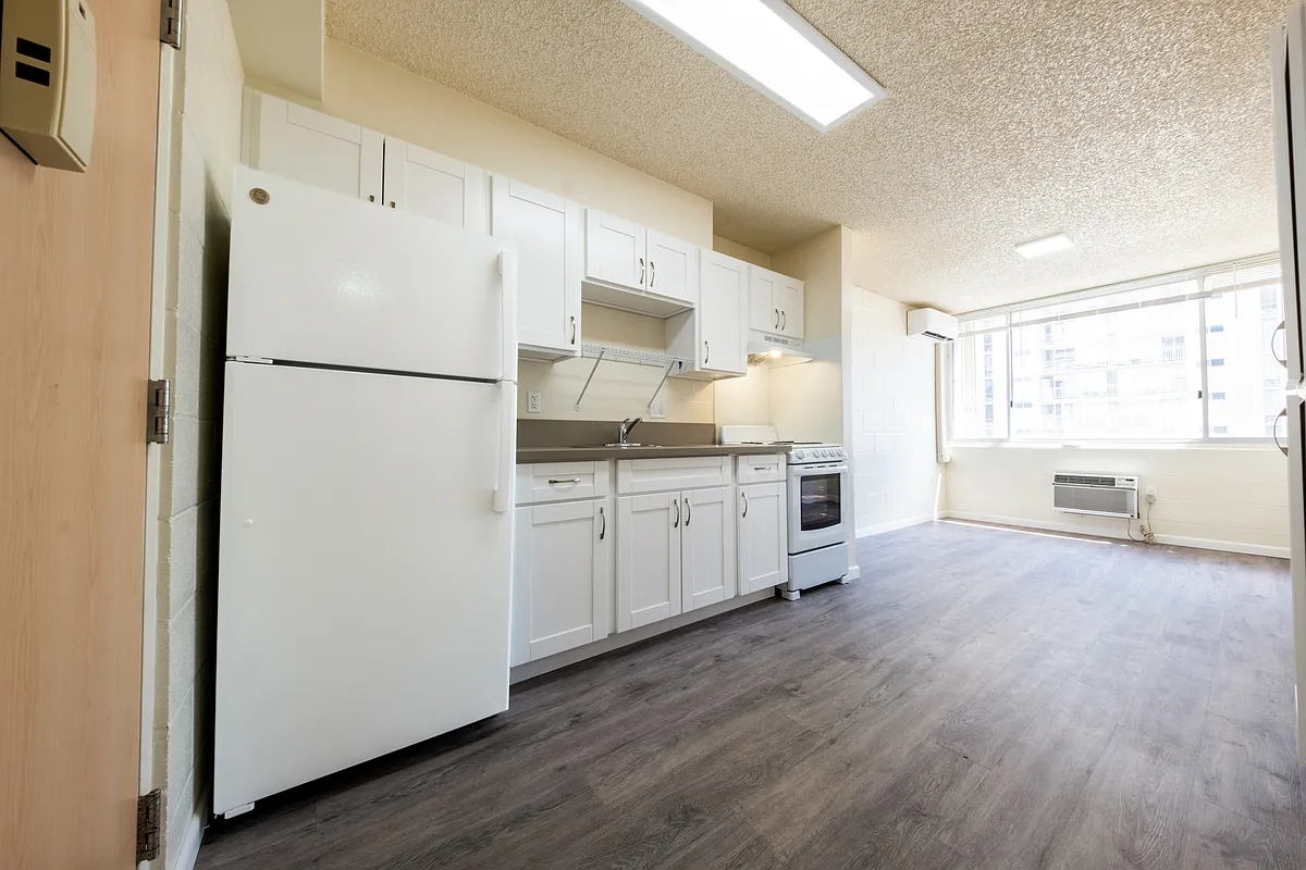 Bright kitchen and living space with abundant natural light. - Wisteria Vista