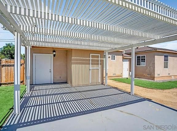 Entrance to unit, including side house gate (private) entrance.