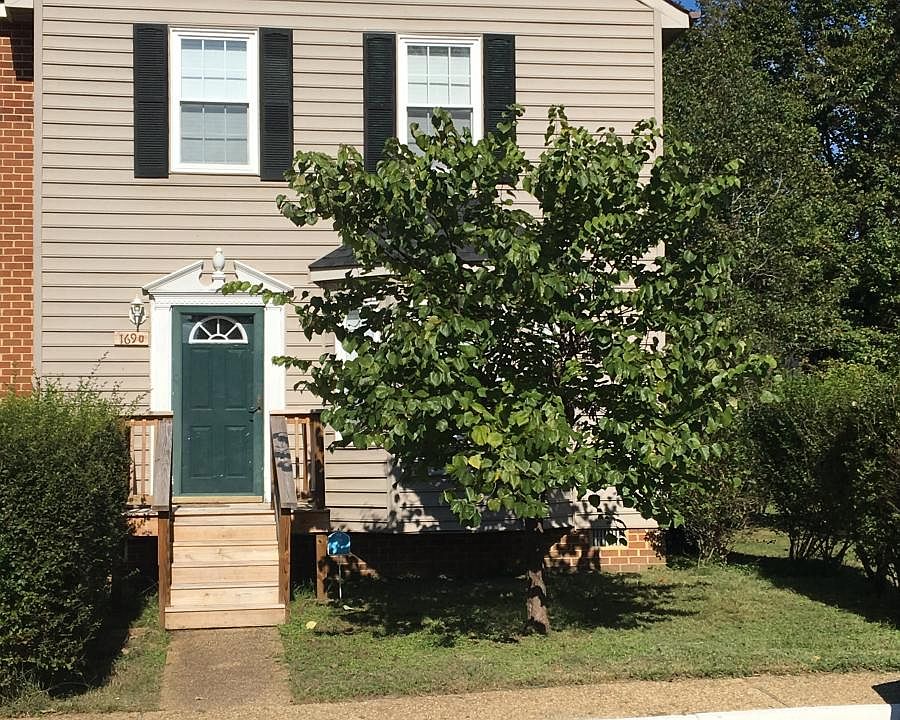 Front of the house has two reserved parking spaces.