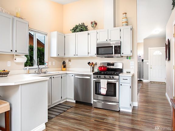 Fresh & Newly painted - Stainless Appliances with Natural Gas Range!