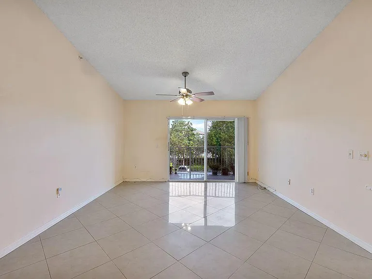 5011 Wiles Rd #303 — Photo 21