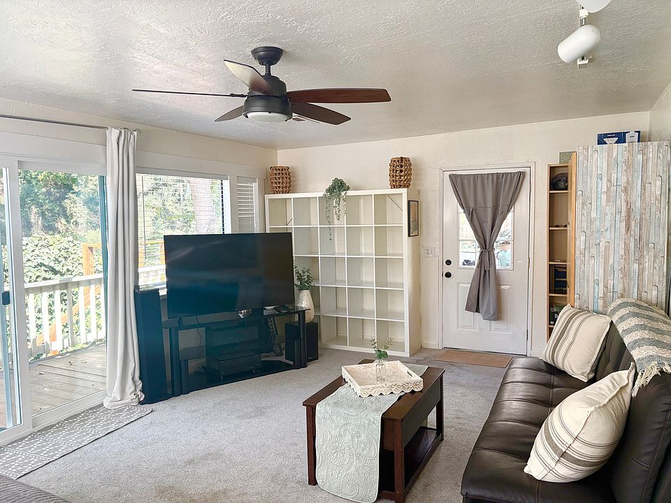 Beautiful cozy living room area with lots of cubby storage.