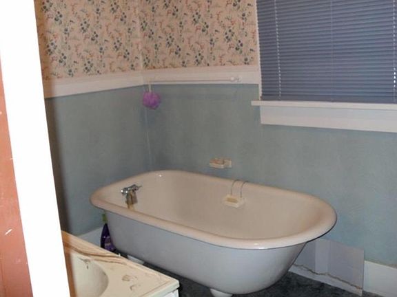 Upstairs bath with original clawfoot tub