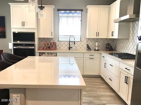 3rd image of 10959 W MELVIN Street W
