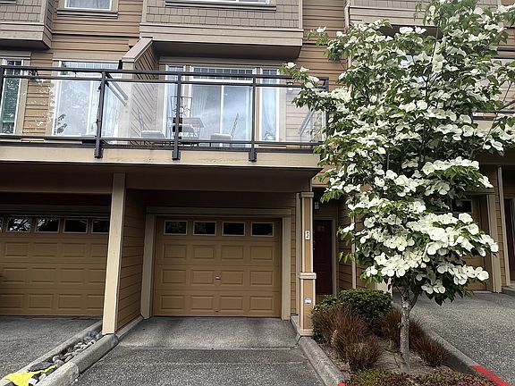 Exterior - tandem 2 car garage on lower level and Patio on 1st floor.