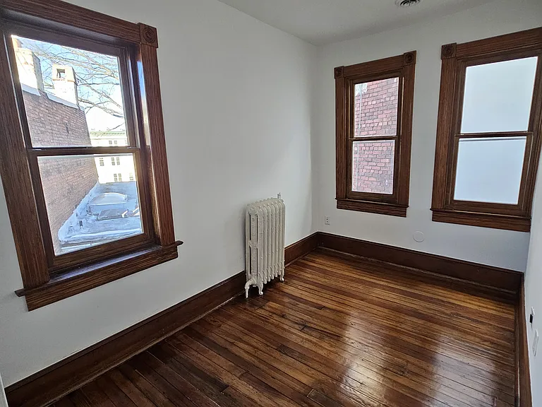 3d floor: rear bedroom with 3 window