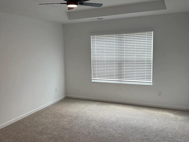 Master bedroom with ceiling fan