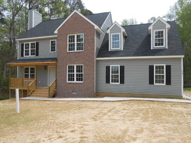 Front with optional brick and dormers.