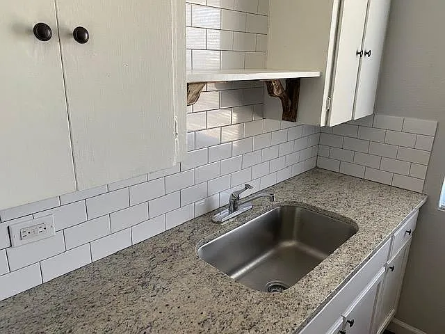 Granite Counters, Subway Tiles and Tons of Cabinets!