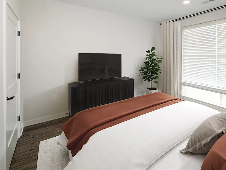 Bedroom with hard-surface flooring