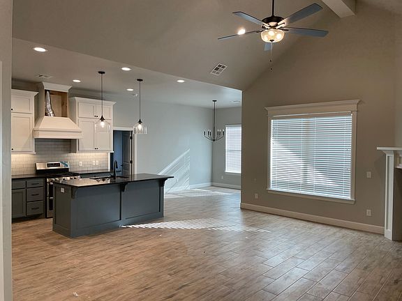 Living Room looking into Kitchen/Dining Nook