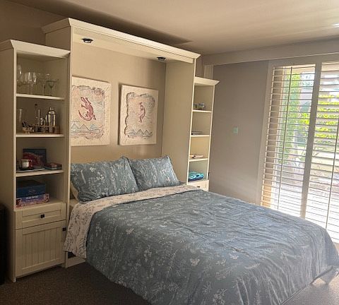 Queen size wall bed.