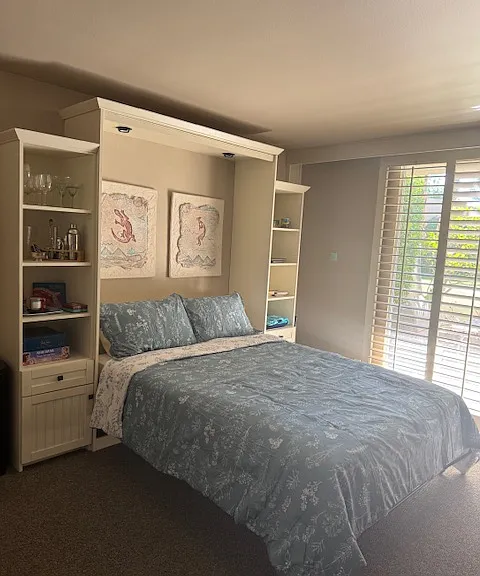 Queen size wall bed.