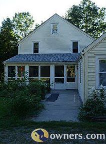 Entrance into house through screen porch