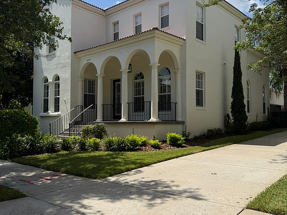 Side View with private driveway to the back and garage