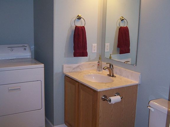 Downstairs half bath with laundry - new tile