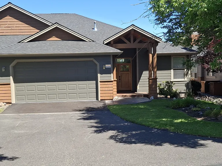 Townhouse with 2 car garage on a quiet street.