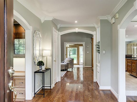 WOW as you enter this beauty, you can see from front to back directly through the heart of the home to the huge backyard!!