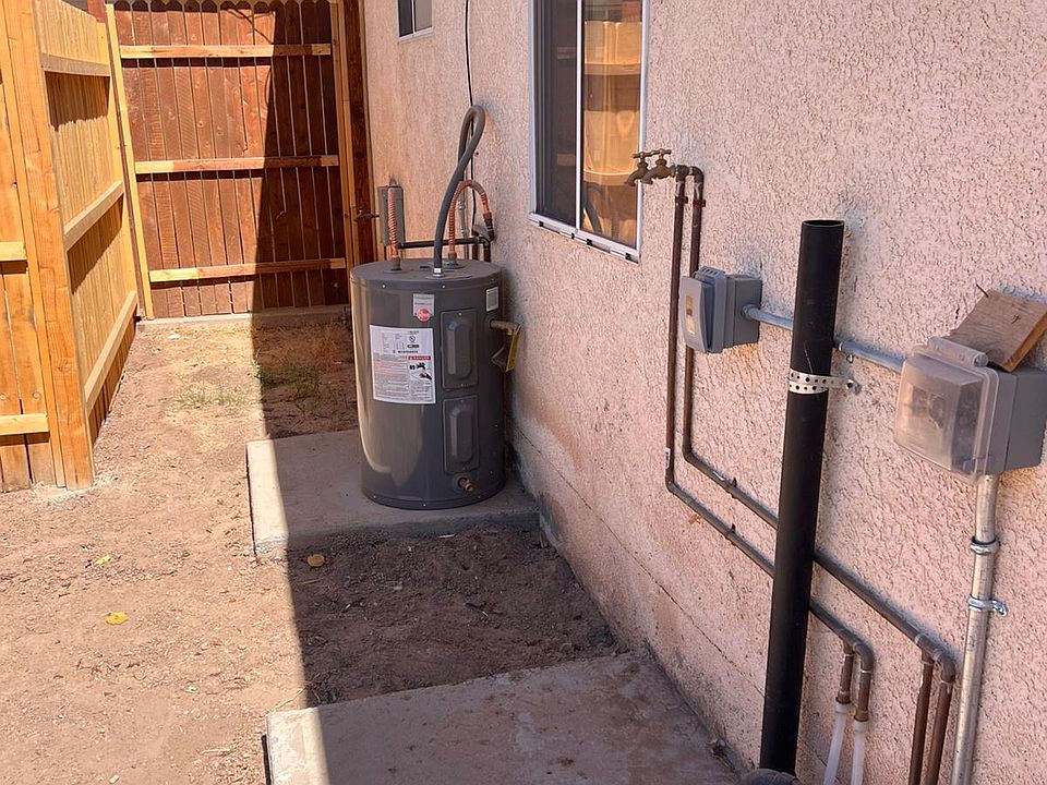 New washer and dryer hookups and electric water heater.