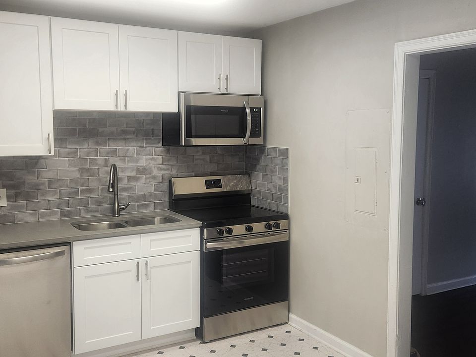 Newly renovated kitchen with stainless steel appliances.