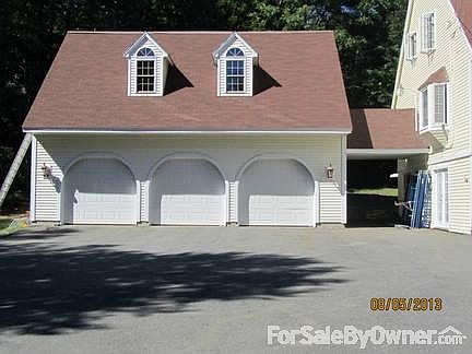 garage entrance on left side, also, with attic above