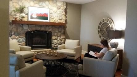 Study with wood burning fireplace