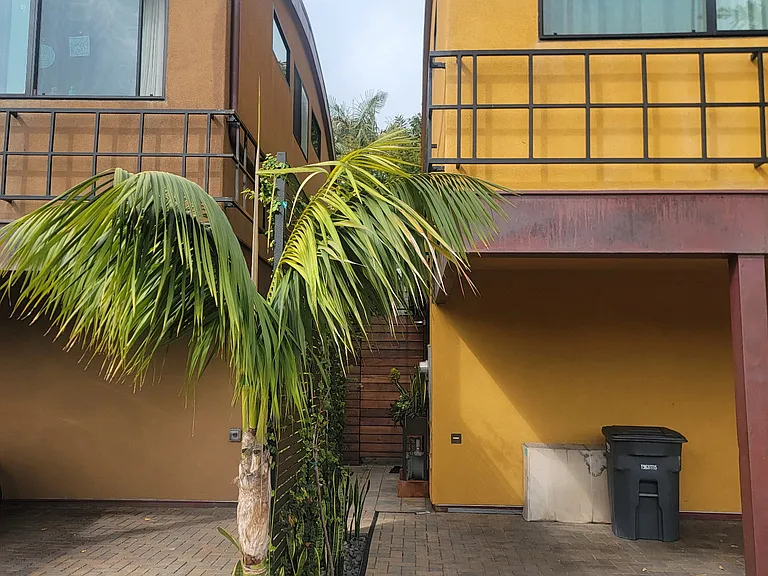 One of three carport spots and side entrance