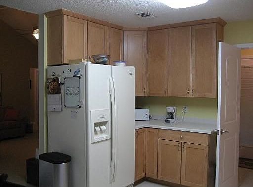 Refrigerator to remain as well as washer and dryer.