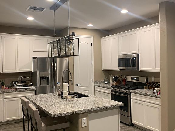 Stainless steel appliances (fridge included) and gas oven & stove
