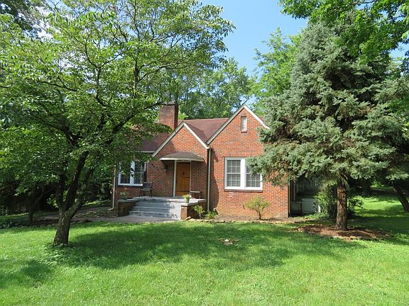 Front lawn, trees, and house