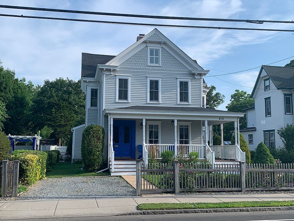 Front of the house with private entrance and private driveway.